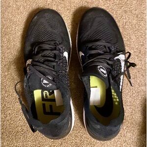Nike Free RN Flyknit 2018
Black / white 
Size 9
Pre- owned